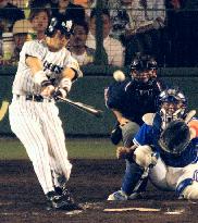 OSAKA, Japan - Hanshin Tigers infielder Shinjiro Hiyama hits an